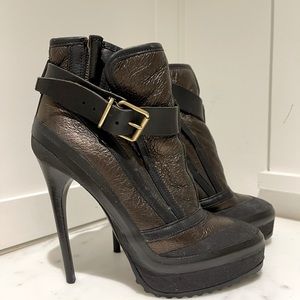 Burberry black Stilettos with a slight metallic sheen.